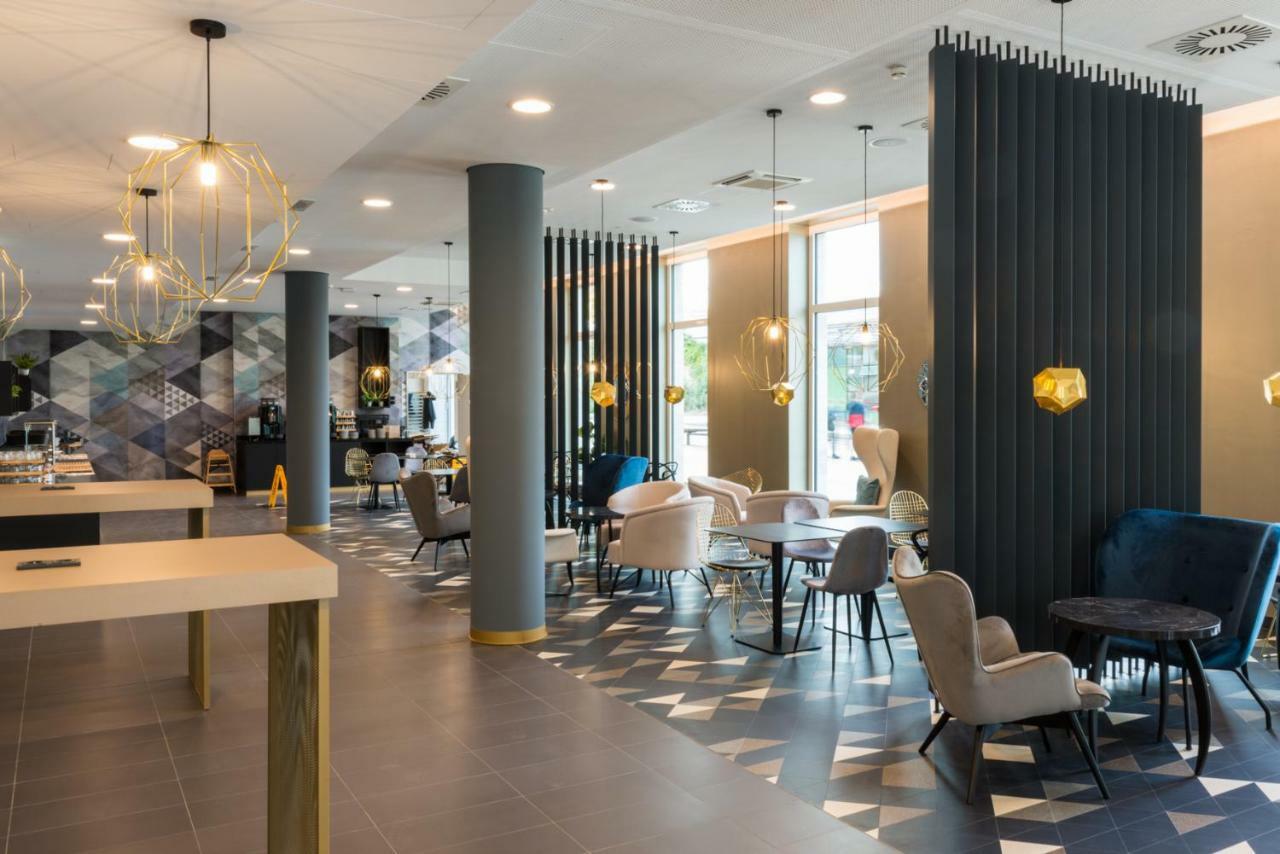 Holiday Inn - The Niu, Ridge Halle Central Station By Ihg Esterno foto
